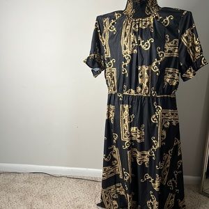 Black and gold dress never been worn